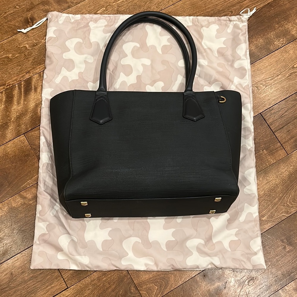 Good user condition Dagne Dover women’s grey purse size 15” laptop